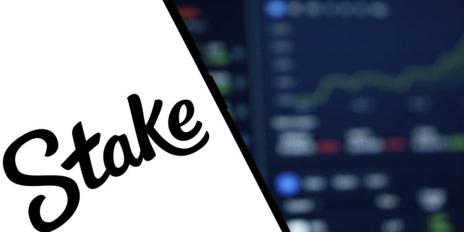 Stake logo split beside a blurred trading/betting screen, representing the platform's block of Irish customers.
