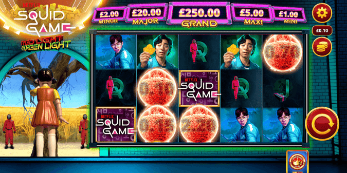 Screenshot of Squid Game slot game from Incentive Games with red orbs, images of Squid Game characters, reels and icons from within the game
