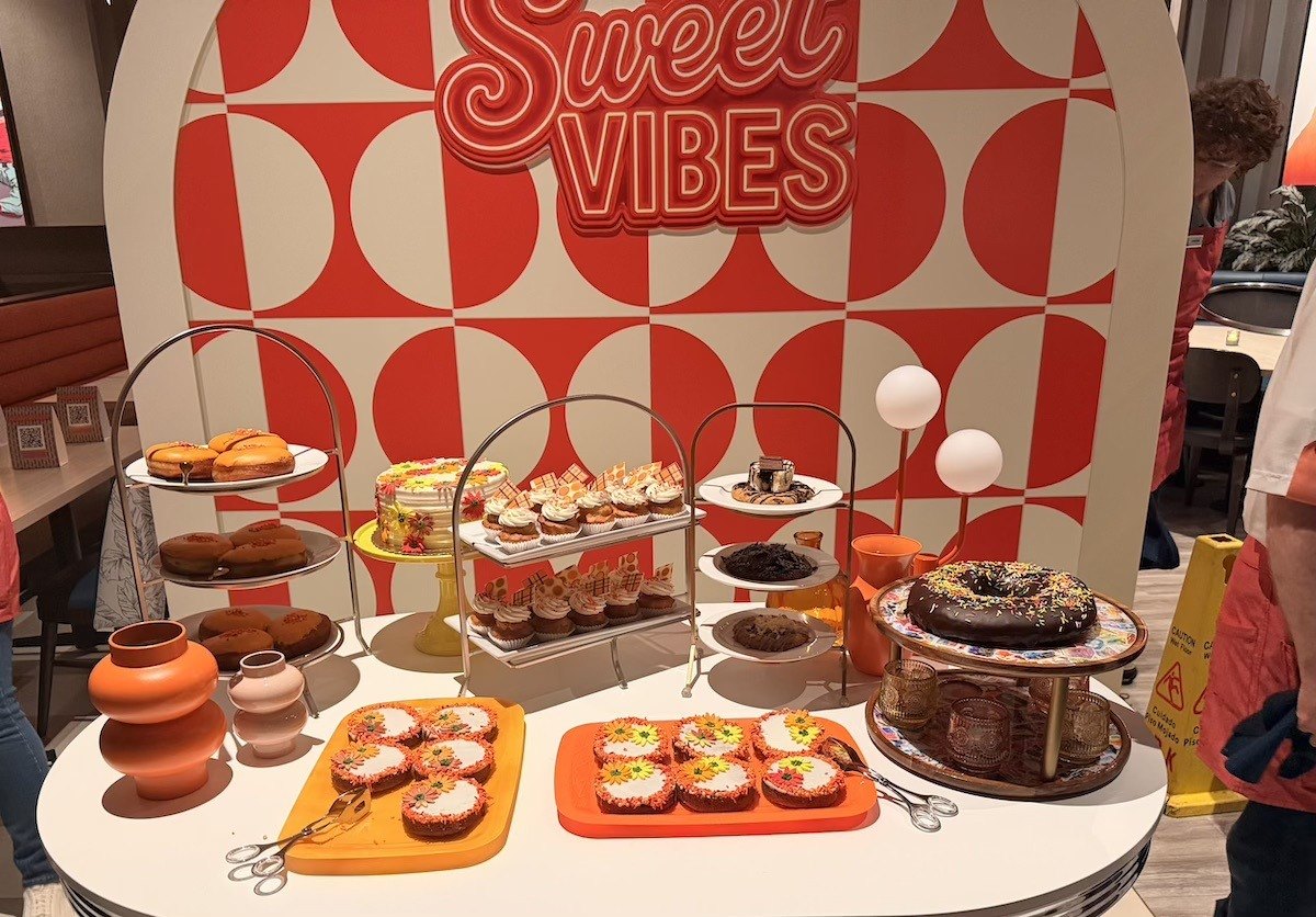 Dessert table with cupcakes, donuts and a giant smores cookie at America restaurant