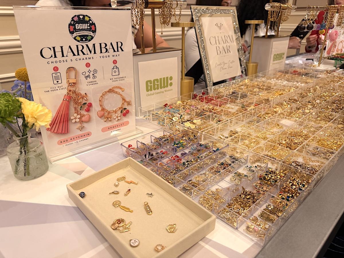 Charm bar display where attendees build their own bracelets at the Global Gaming Women Retreat