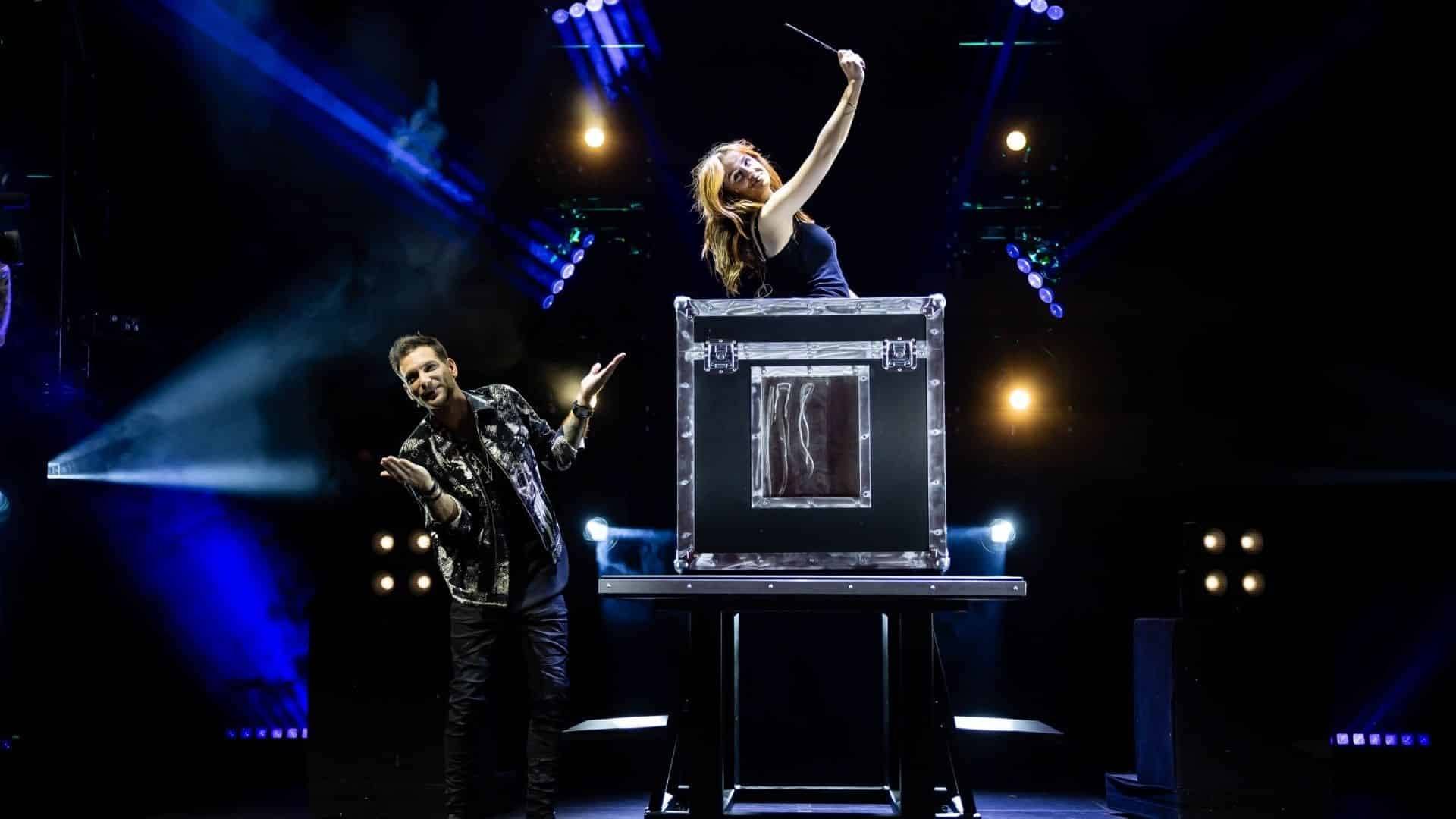 A magician's assistant performing during Now You See Me Live