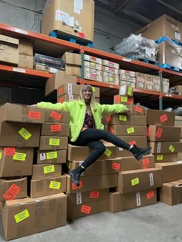 Stefania Haralambie with boxes of slots