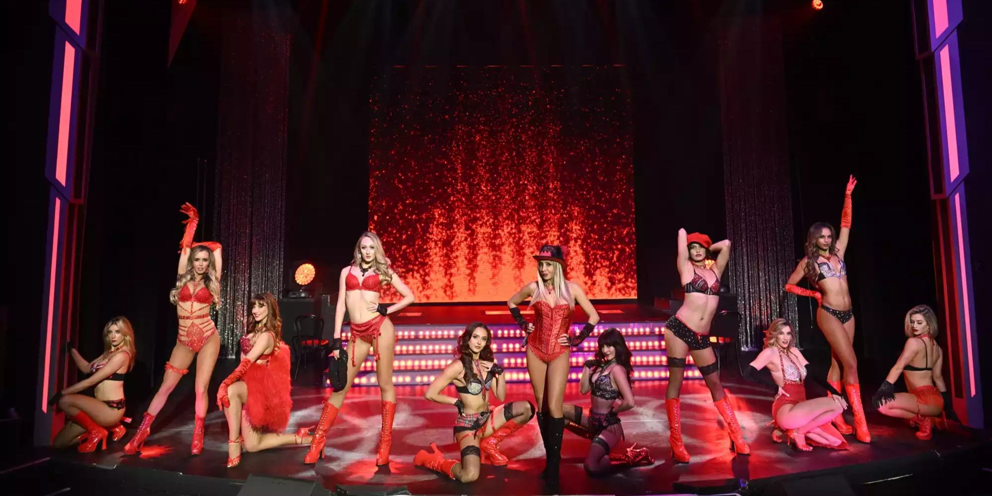 the female dancers of the fantasy show at the Luxor dressed in red