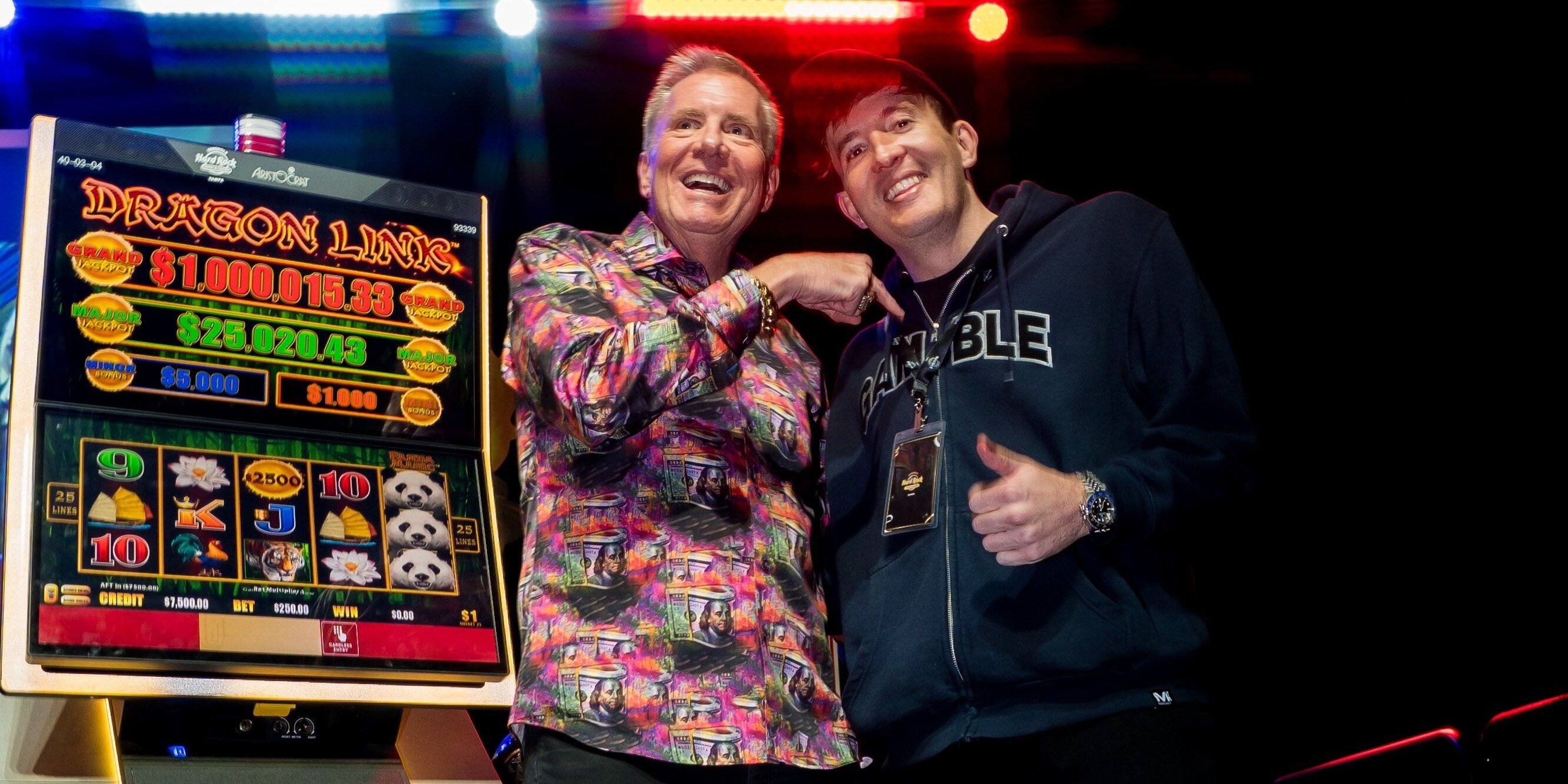 VegasMatt poses with a fan in front of a Dragon Link machine.