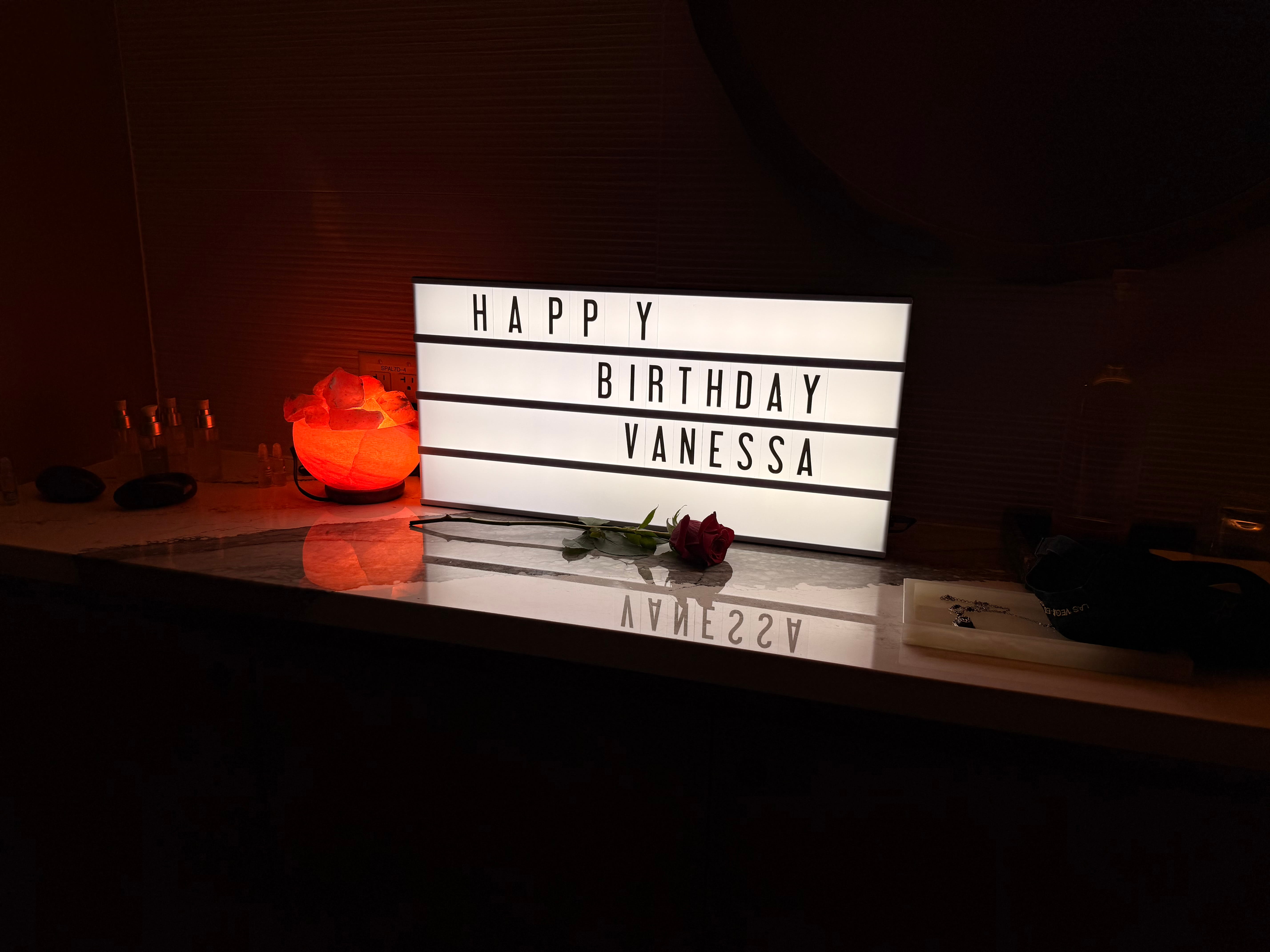 a sign in a fontainebleau spa massage treatment room that reads happy birthday Vanessa