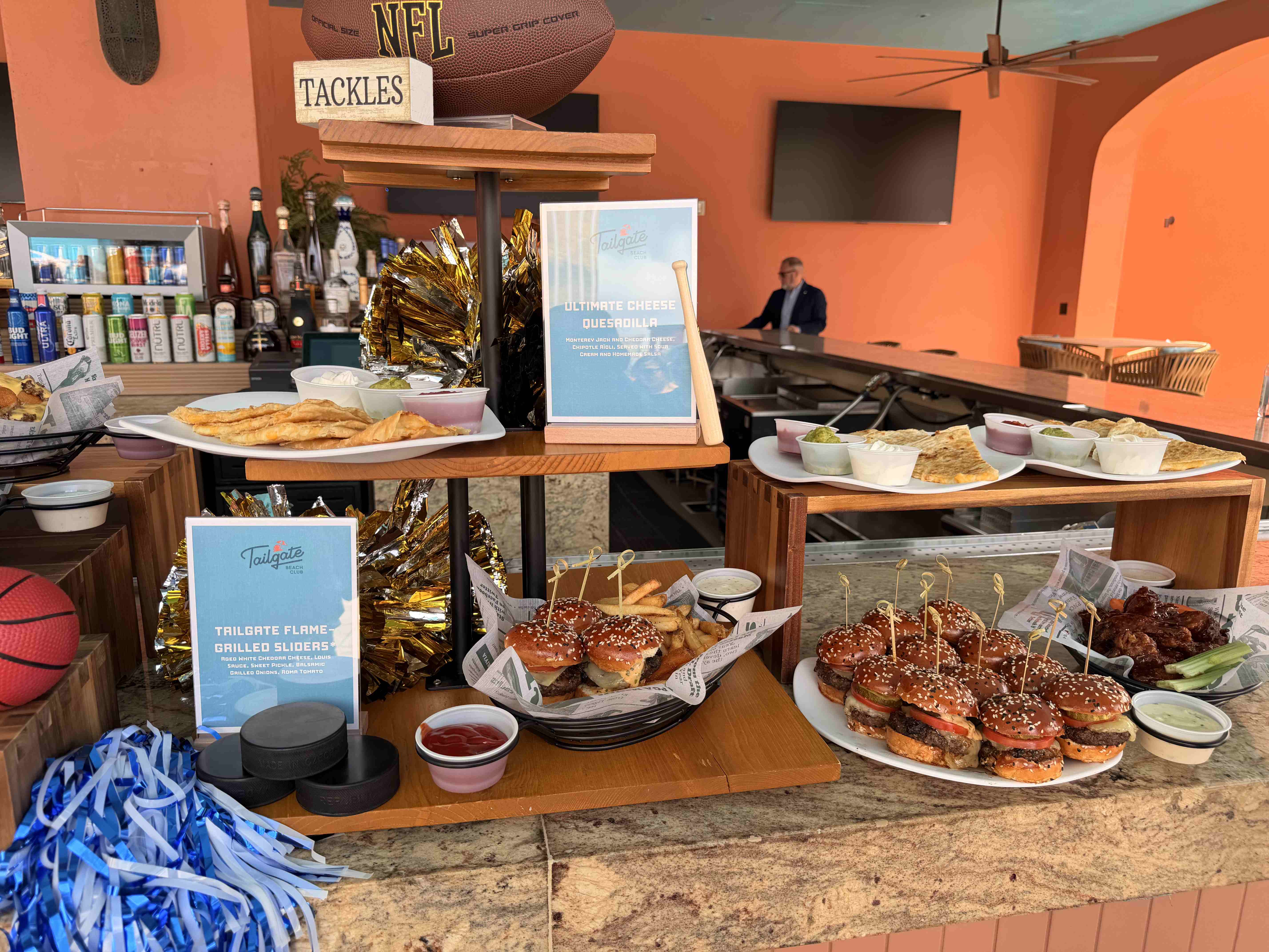 Sliders, wings, and other food at Tailgate Beach Club
