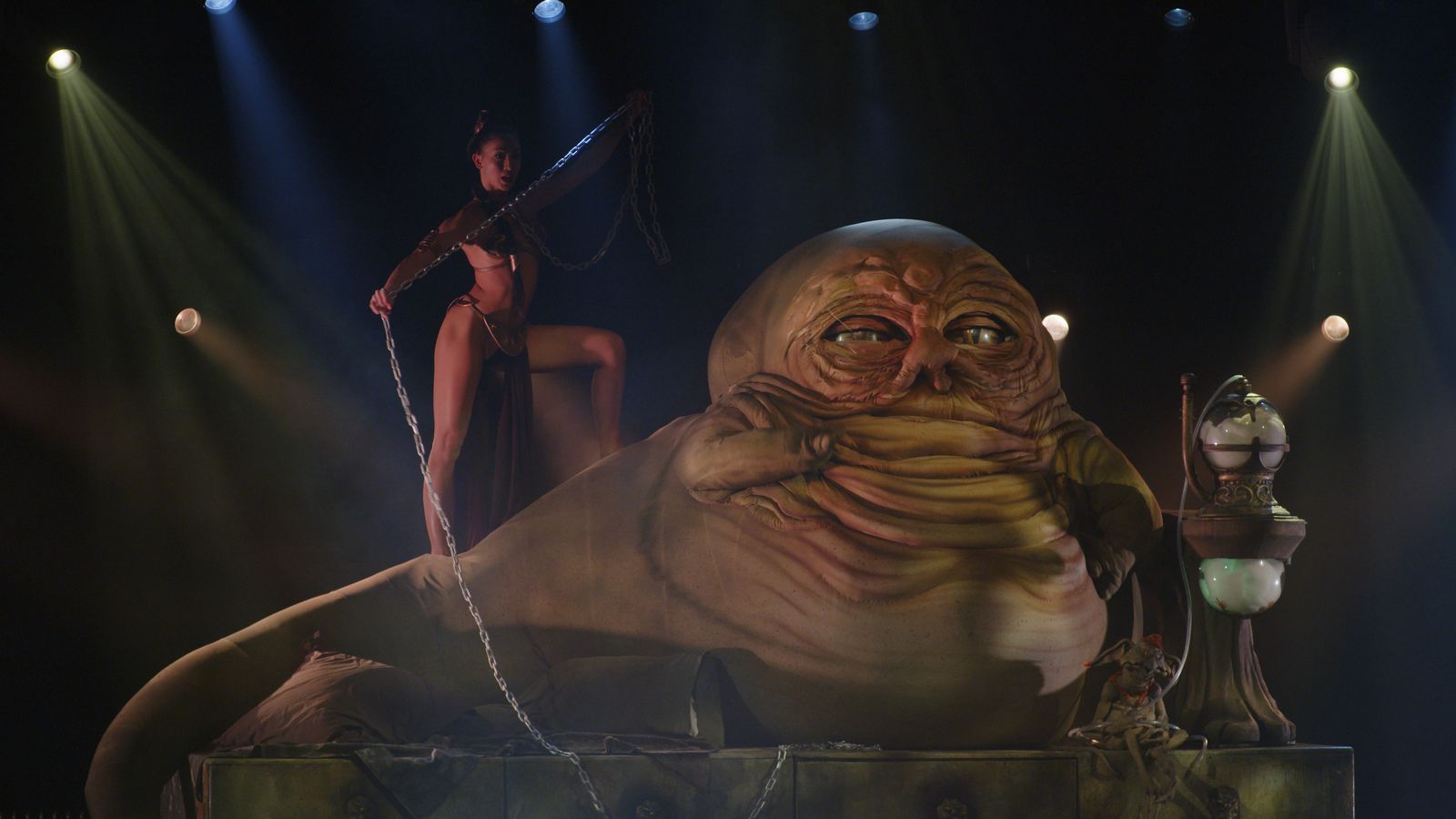 Jabba the Hutt with a burlesque performer in The Empire Strips Back