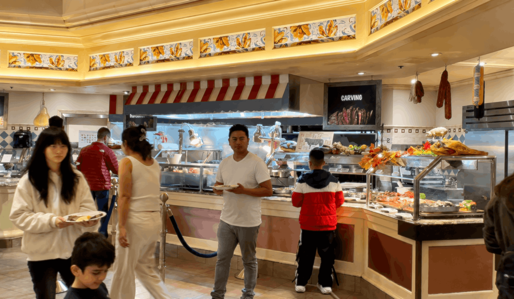 Guests walk around at the Bellagio Buffet area.