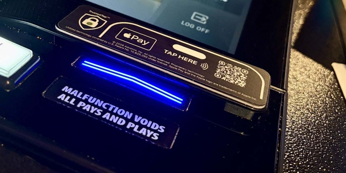 Closeup image of Apple Pay tab on bartop machine.