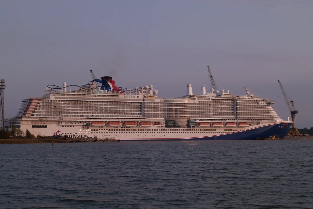 Carnival Cruise Line's Mardi Gras ship showing its rooftop rollercoaster