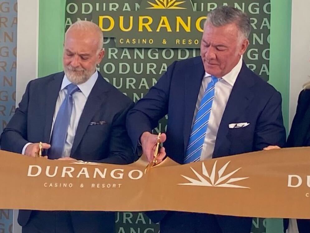 Station Casinos owners Frank Fertitta III and Lorenzo Fertitta cut the ribbon during the opening ceremony for Durango Casino & Resort.