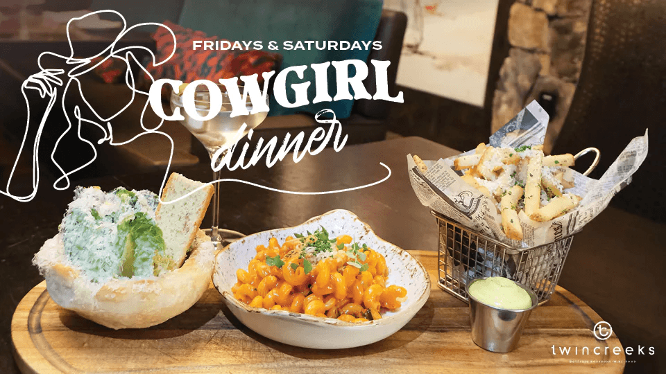 Cowgirl dinner spread with martini and Caesar salad at Twin Creeks Steakhouse inside Silverton Casino