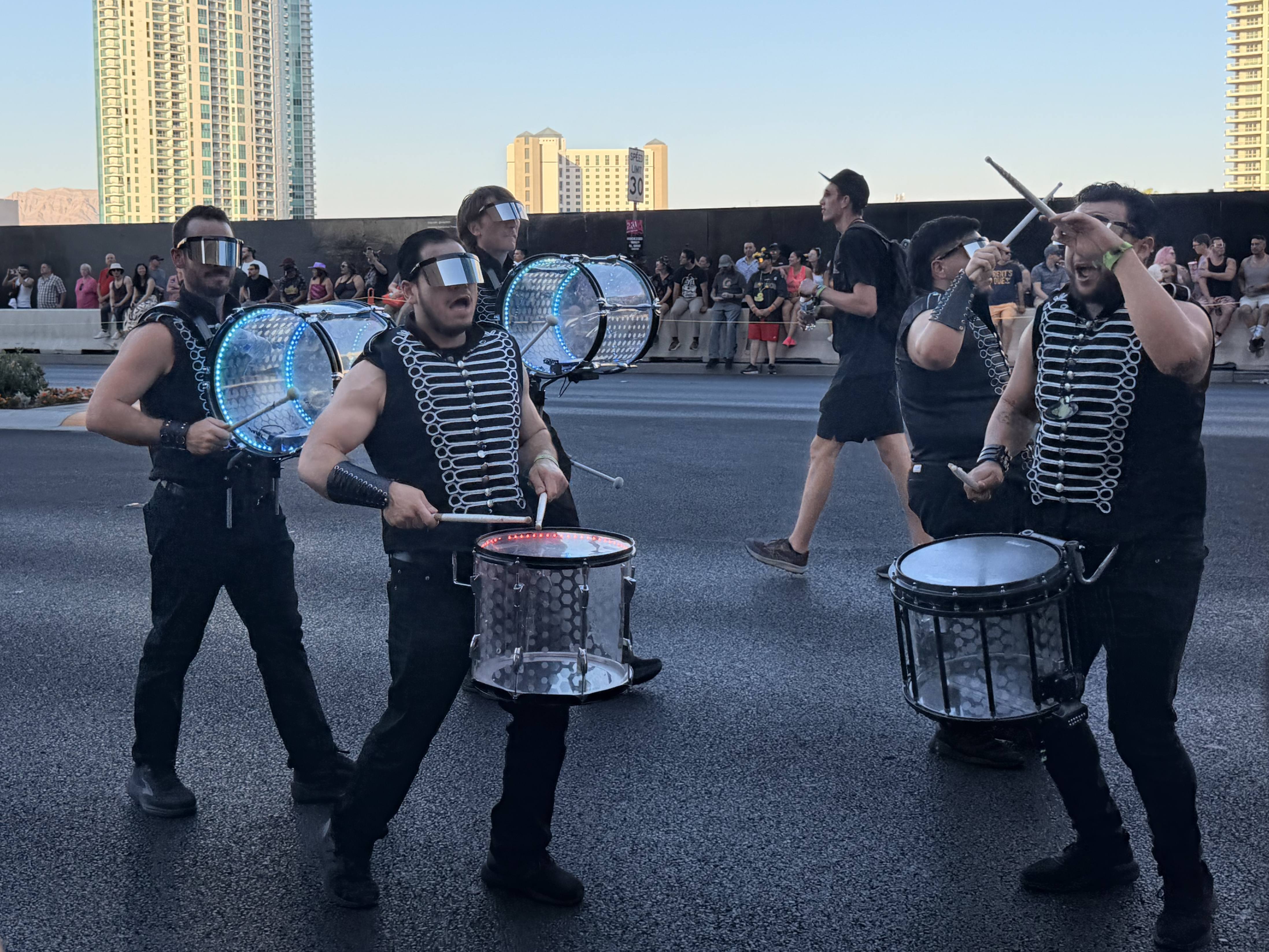 Several drummers proceed in the street during EDC World Party Parade