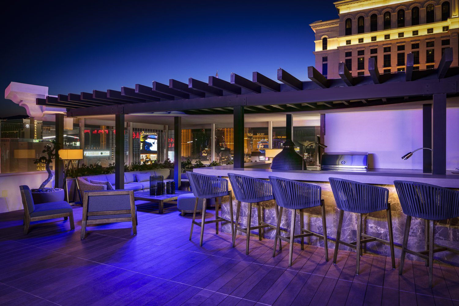 Nobu Villa rooftop terrace bar and barbecue pit at night